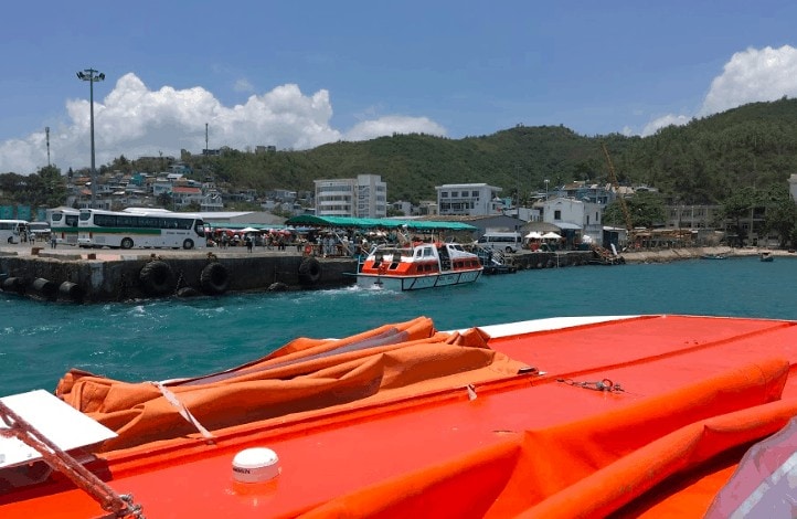 cruise ship tendering vietnam princess cruises orange tender boat