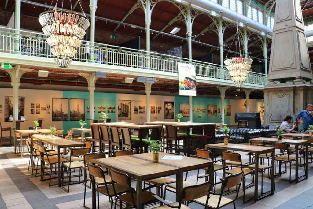 Tables and chairs in an art deco foyer
