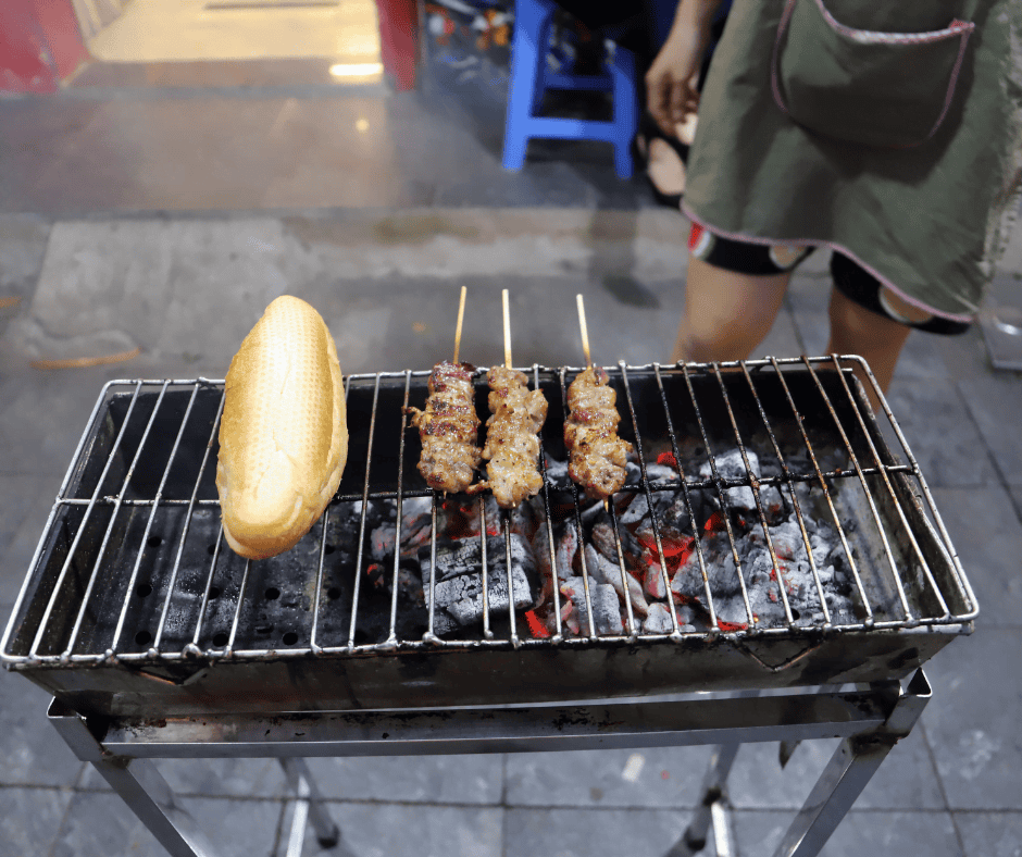 Honey Bread and meat skewers grilling on a barbeque