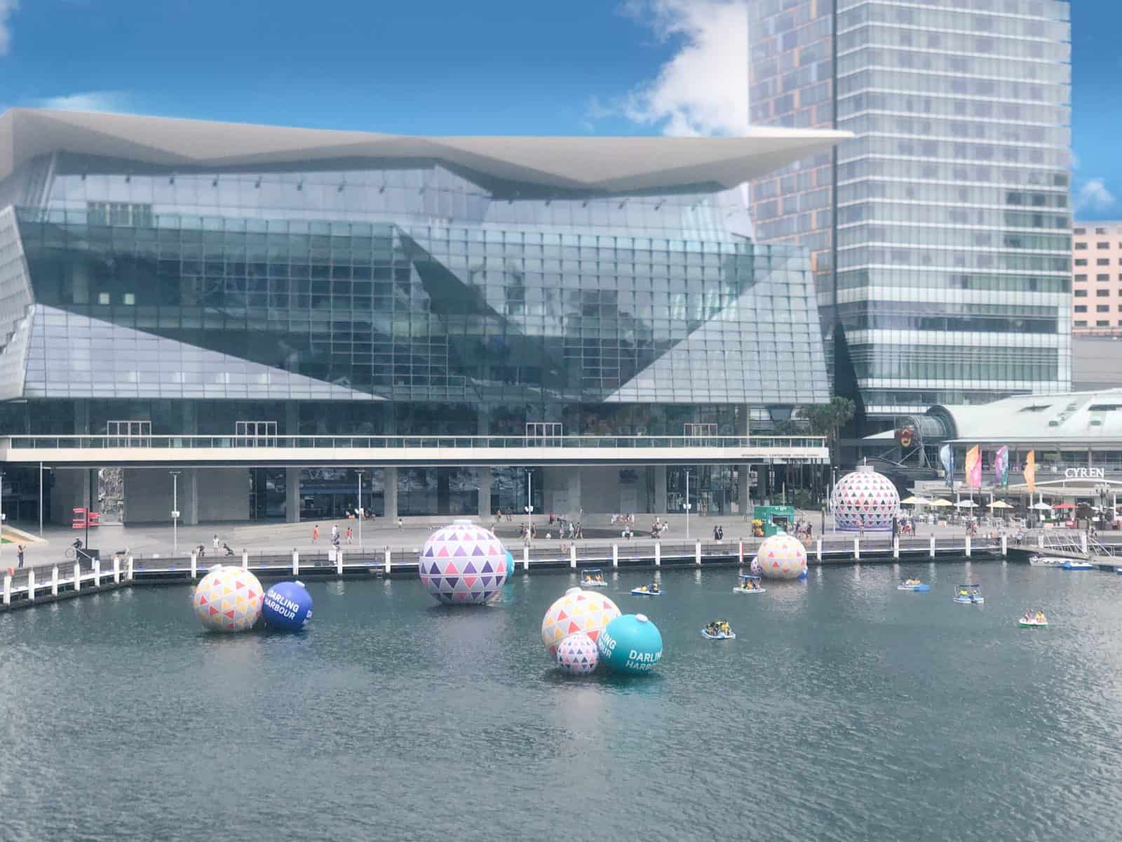 Inflatable Christmas Baubles floating on Darling Harbour