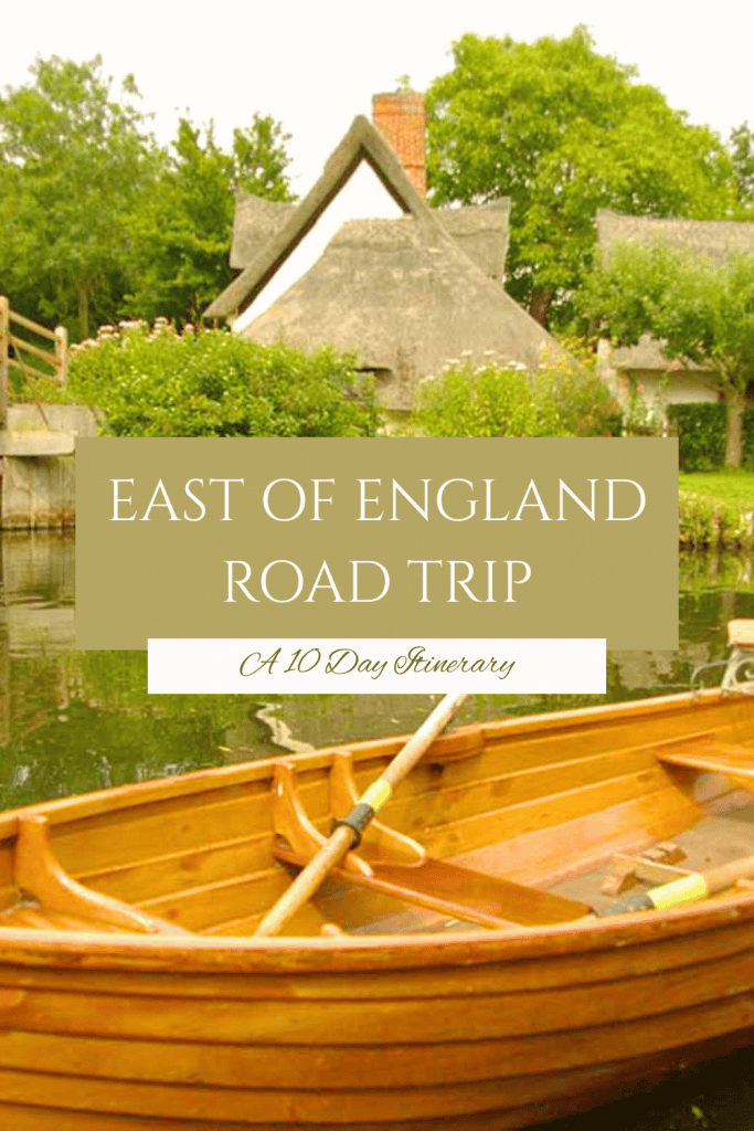 Beautiful Cotswold village scene featuring a wooden boat on a tranquil river, traditional thatched cottages, lush greenery, and a peaceful atmosphere in East of England.