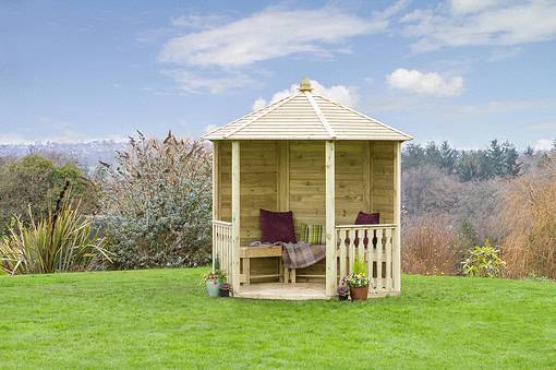 Garden gazebo with wooden construction and seating area surrounded by lush green lawn and colorful potted plants, perfect for outdoor relaxation and garden decor, by Empire Home and Garden.