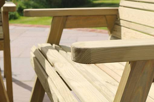 Smooth natural wood outdoor bench with armrest, ideal for garden sitting areas and landscaping. Perfect for outdoor furniture, backyard relaxation, and garden decor.
