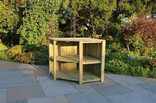 Wood outdoor plant stand or garden shelf for patio or backyard decor.
