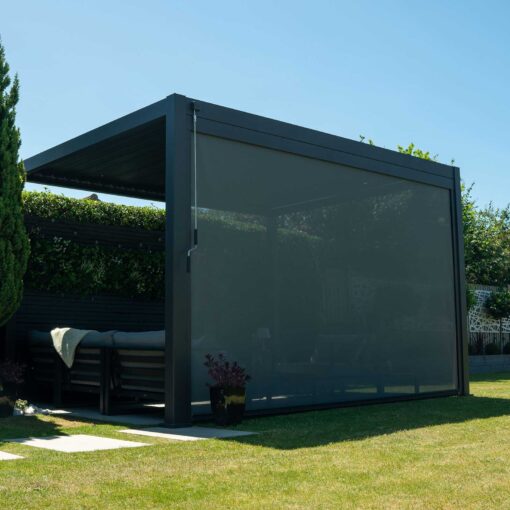 A modern outdoor backyard pergola with a sleek black metal frame and a retractable shade or screen, designed for stylish outdoor living and garden aesthetics.