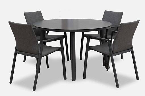 Modern black dining table with six upholstered gray chairs, perfect for home and garden interiors, offering stylish seating for family meals and gatherings.