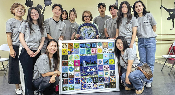 Korean American students and parents from Help on the Go present the Peace by Piece tile mural to California State Senator María Elena Durazo in Echo Park