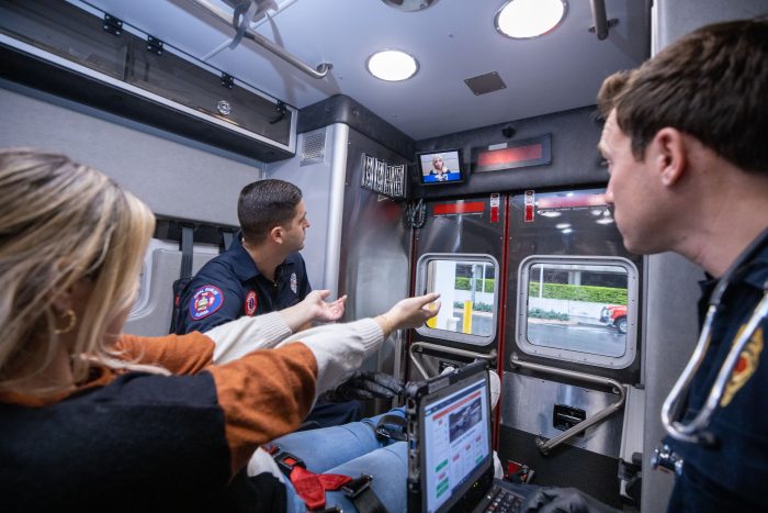 During training, community paramedics use a tablet computer to contact physicians by video.