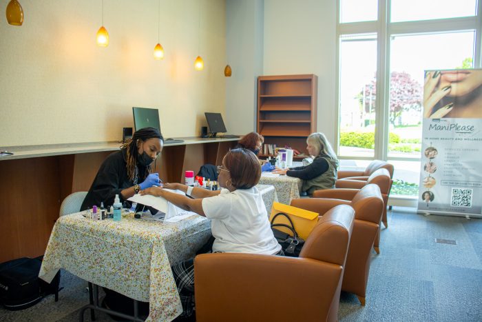 Stamford Health patients receiving complimentary manicures during the kick-off event May 11. 