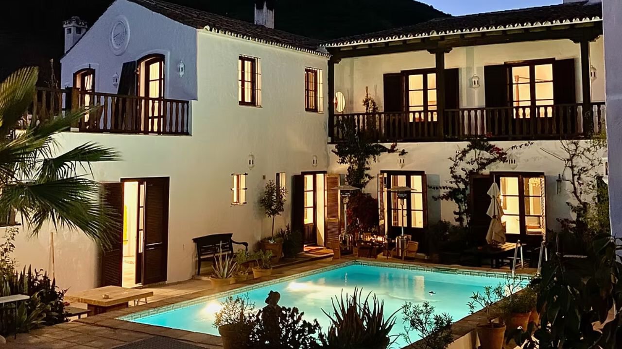 Courtyard with pool at night