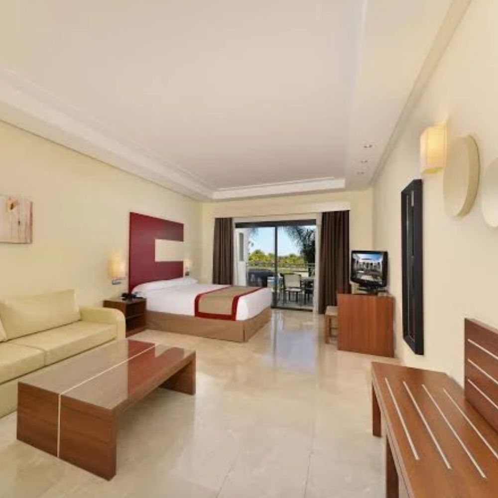 Spacious hotel suite with balcony view