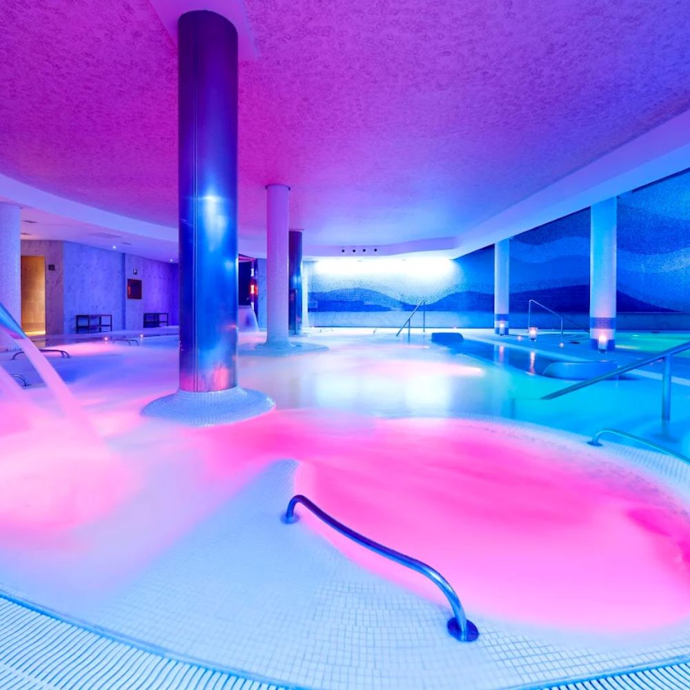 Indoor spa pool with colored lights