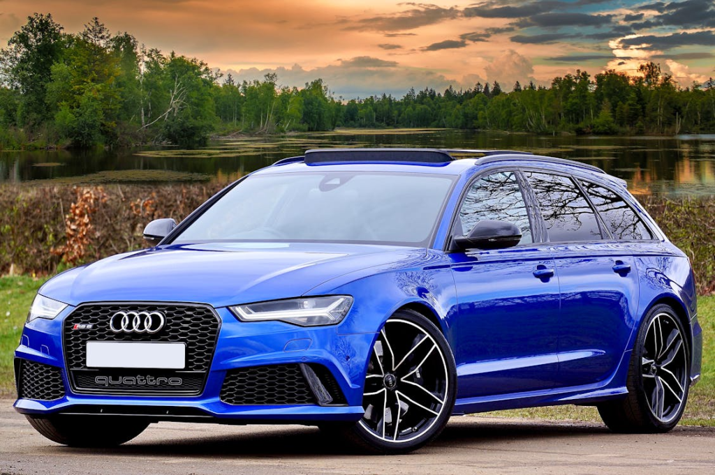 High-quality OEM-grade paint match on a blue Audi Quattro station wagon.