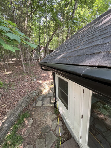 Efficient clog-free gutter system protecting home from water damage in Kentucky.