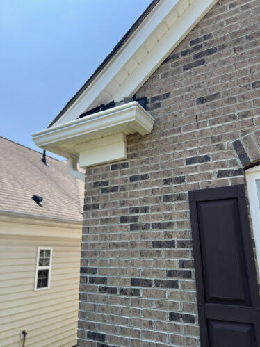 Highly functional gutter system with clog prevention at a residential home in Kentucky.