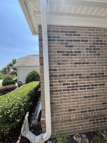 Gutter system with leaf guard in place, ensuring clog-free drainage for home in Cincinnati, Kentucky.