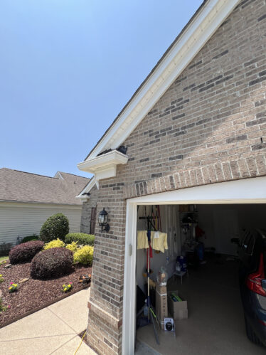 High-quality gutter system installed to prevent clogs and ensure maintenance-free operation.