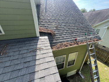 Close-up of a clean, clog-free gutter system on a residential home in Kentucky.