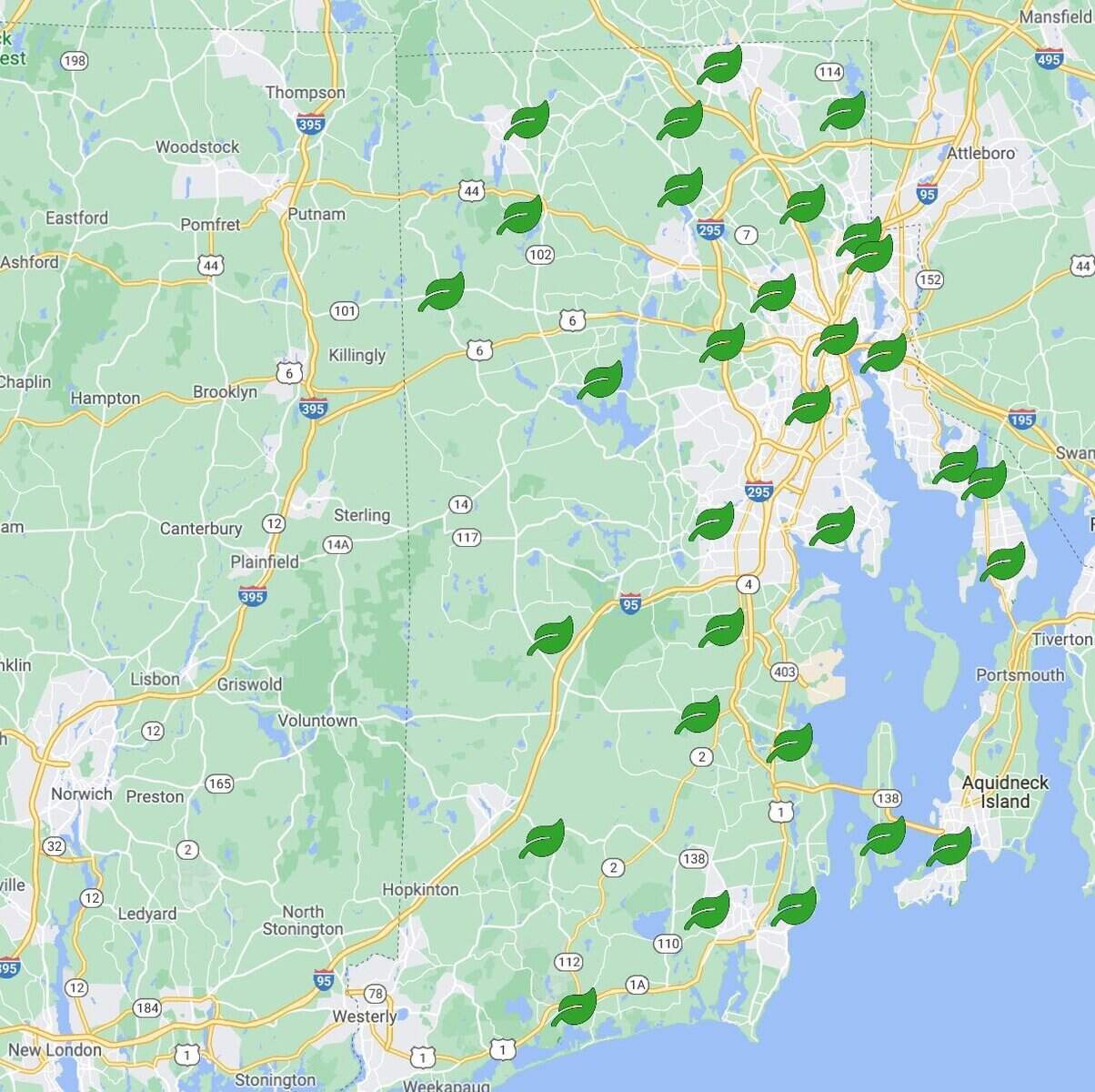 Map showing multiple green leaf icons across Rhode Island and Connecticut, placed along highways and towns, indicating eco-friendly locations or initiatives.