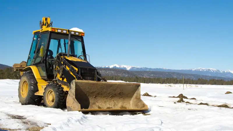 snow removal equipment for backhoes