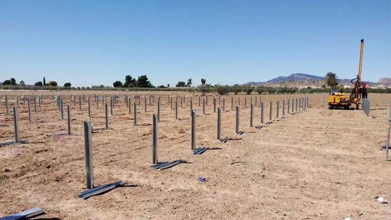 Everstar pile drivers operationg in a solar farm field