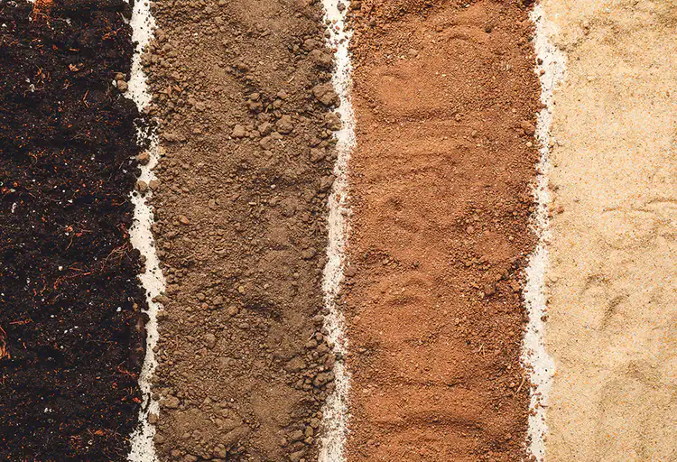 Different soil types that a solar piling drilling rig can work in