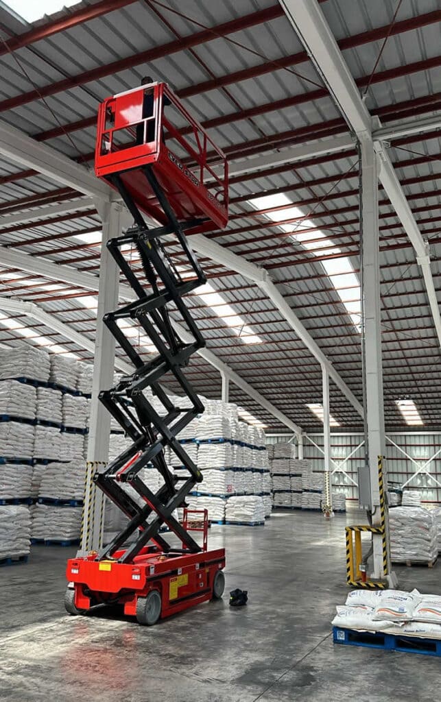 EVERSTAR Scissor Lifts Working in a Warehouse
