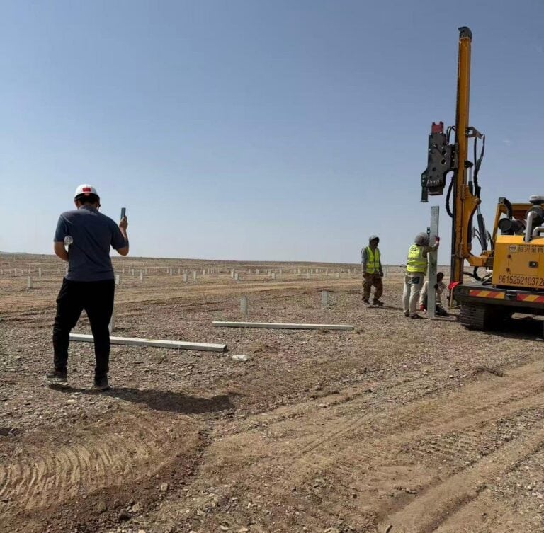 EVERSTAR: Solar pile drivers on construction site.