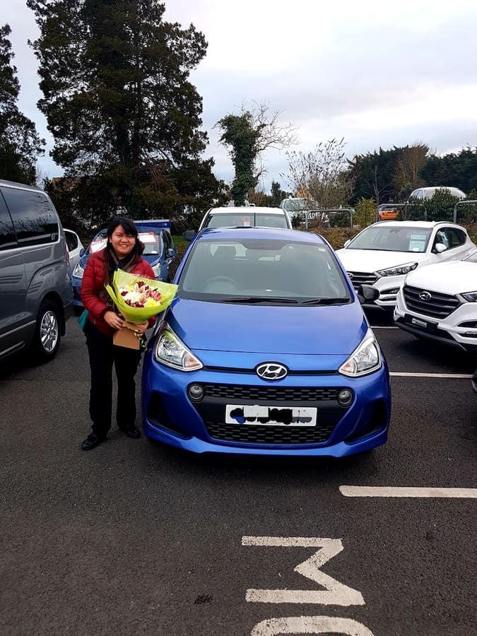 blue car driving in the UK