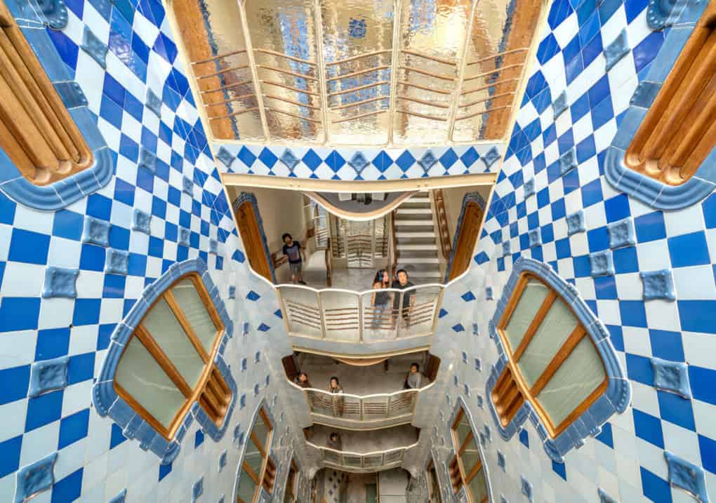 white and blue tiles on the inner patio of Casa Batlló