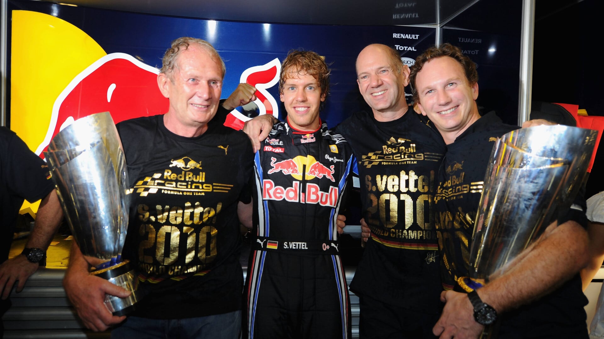 F1 Grand Prix Of Abu Dhabi Race ABU DHABI, UNITED ARAB EMIRATES - NOVEMBER 14: Race winner and F1 2010 World Champion Sebastian Vettel (2nd left) of Germany and Red Bull Racing celebrates with Red Bull Racing Motorsport Consultant Dr Helmut Marko (left), Red Bull Racing Chief Technical Officer Adrian Newey (2nd right) and Red Bull Racing Team Principal Christian Horner (right) in their team garage following the Abu Dhabi Formula One Grand Prix at the Yas Marina Circuit on November 14, 2010 in Abu Dhabi, United Arab Emirates. (Photo by Clive Mason/Getty Images) *** Local Caption *** Sebastian Vettel; Christian Horner; Adrian Newey; Helmut Marko // Getty Images / Red Bull Content Pool // SI201412040507 // Usage for editorial use only //