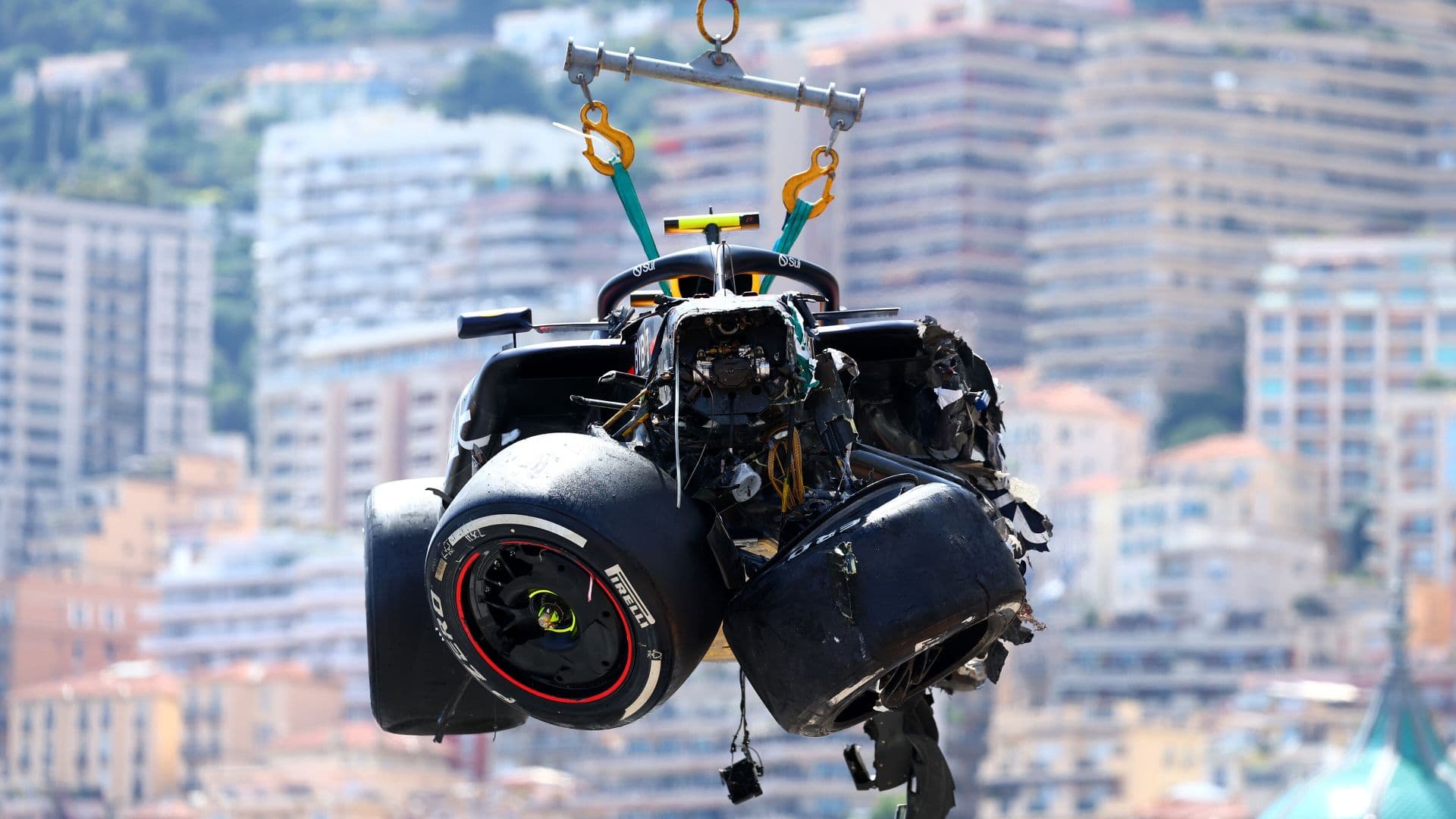 MONTE-CARLO, MONACO - MAY 26: The car of Sergio Perez of Mexico and Oracle Red Bull Racing is recovered from the track after crashing during the F1 Grand Prix of Monaco at Circuit de Monaco on May 26, 2024 in Monte-Carlo, Monaco. (Photo by Clive Rose/Getty Images) *** BESTPIX *** // Getty Images / Red Bull Content Pool // SI202405260966 // Usage for editorial use only //