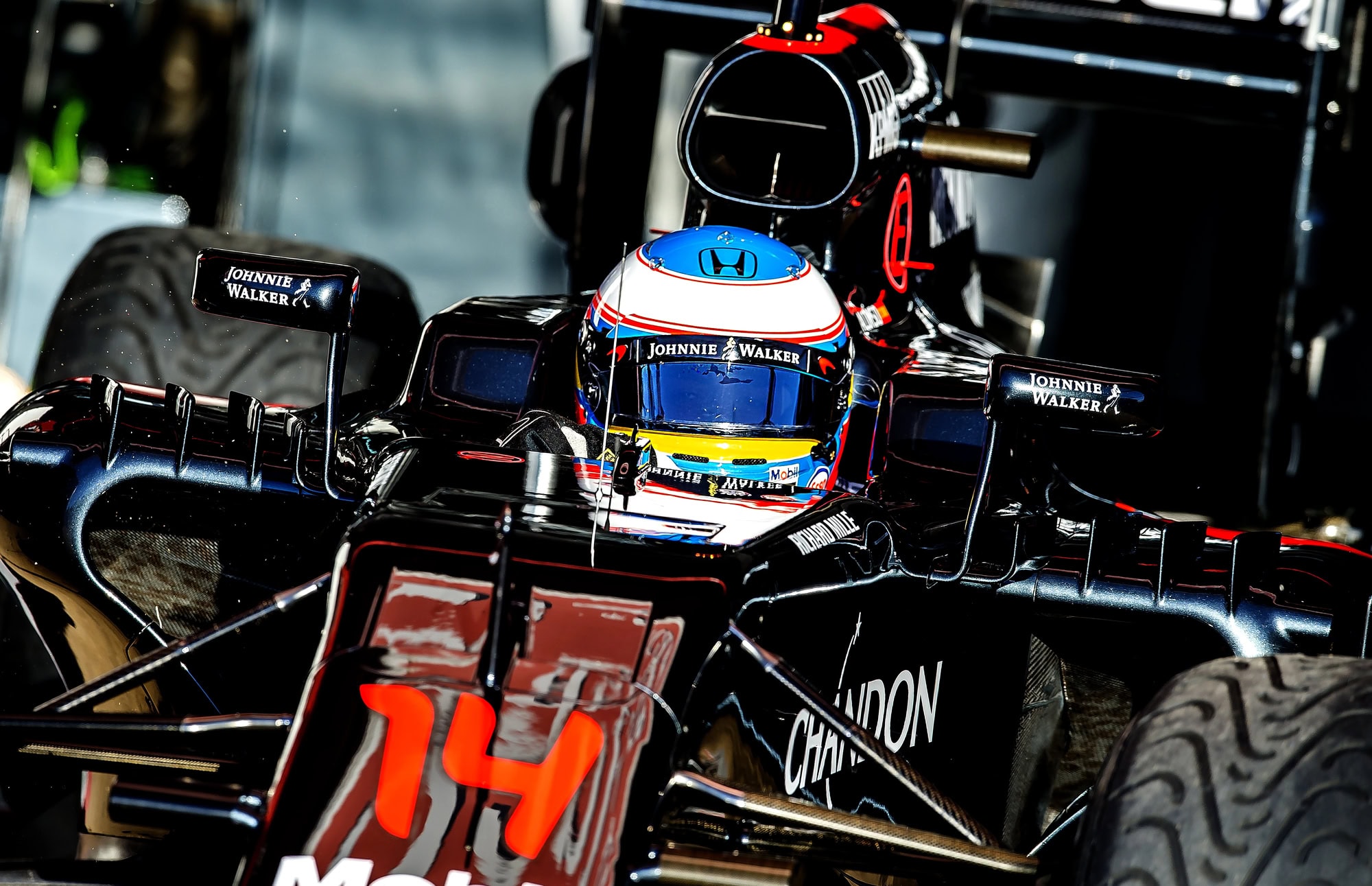 Position 8 - Fernando Alonso (94 race starts) Fernando Alonso, the Spanish double world champion, raced for McLaren across two stints—2007 and 2015–2018—totalling 94 starts in a tenure marked by brilliance and turbulence. Joining in 2007 fresh off titles with Renault, he won four races, including Monaco, and finished third in the championship, but his season was overshadowed by a fierce rivalry with teammate Lewis Hamilton, prompting his exit after one year. Returning in 2015 during McLaren’s struggling Honda era, Alonso endured three winless seasons, managing only occasional points finishes with uncompetitive cars. His McLaren legacy reflects a mix of standout performances and frustration, retiring from F1 in 2018 before later returning with Alpine. Image via ivi7g/Deposit Photos