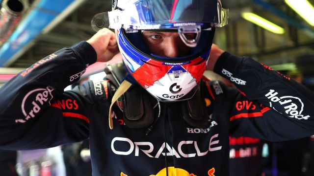 F1 Grand Prix Of Italy Qualifying F1 driver preparing in garage for race or practice session.