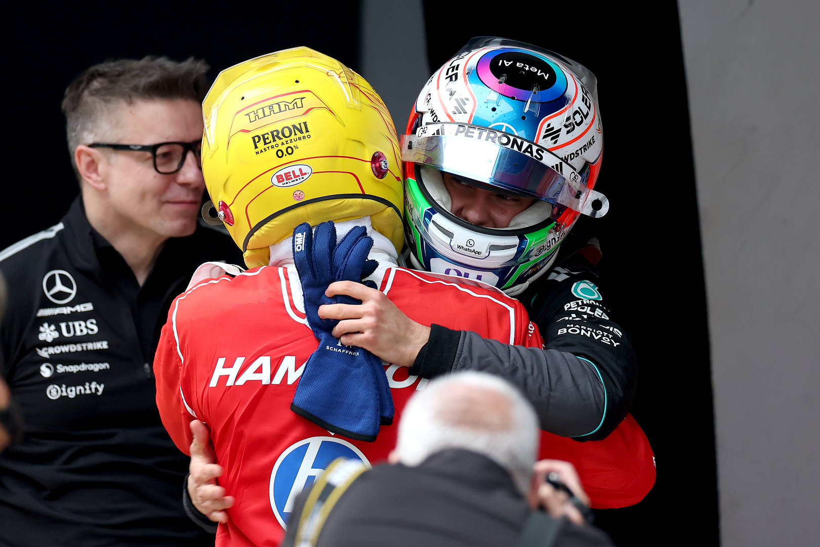 Chinese Grand Prix, Sunday, Getty Images SHANGHAI, CHINA - MARCH 15: Race winner Andrea Kimi Antonelli of Italy and Mercedes AMG Petronas F1 Team and Third placed Lewis Hamilton of Great Britain and Scuderia Ferrari congratulate each other in parc ferme during the F1 Grand Prix of China at Shanghai International Circuit on March 15, 2026 in Shanghai, China. (Photo by Dom Gibbons/LAT Images)