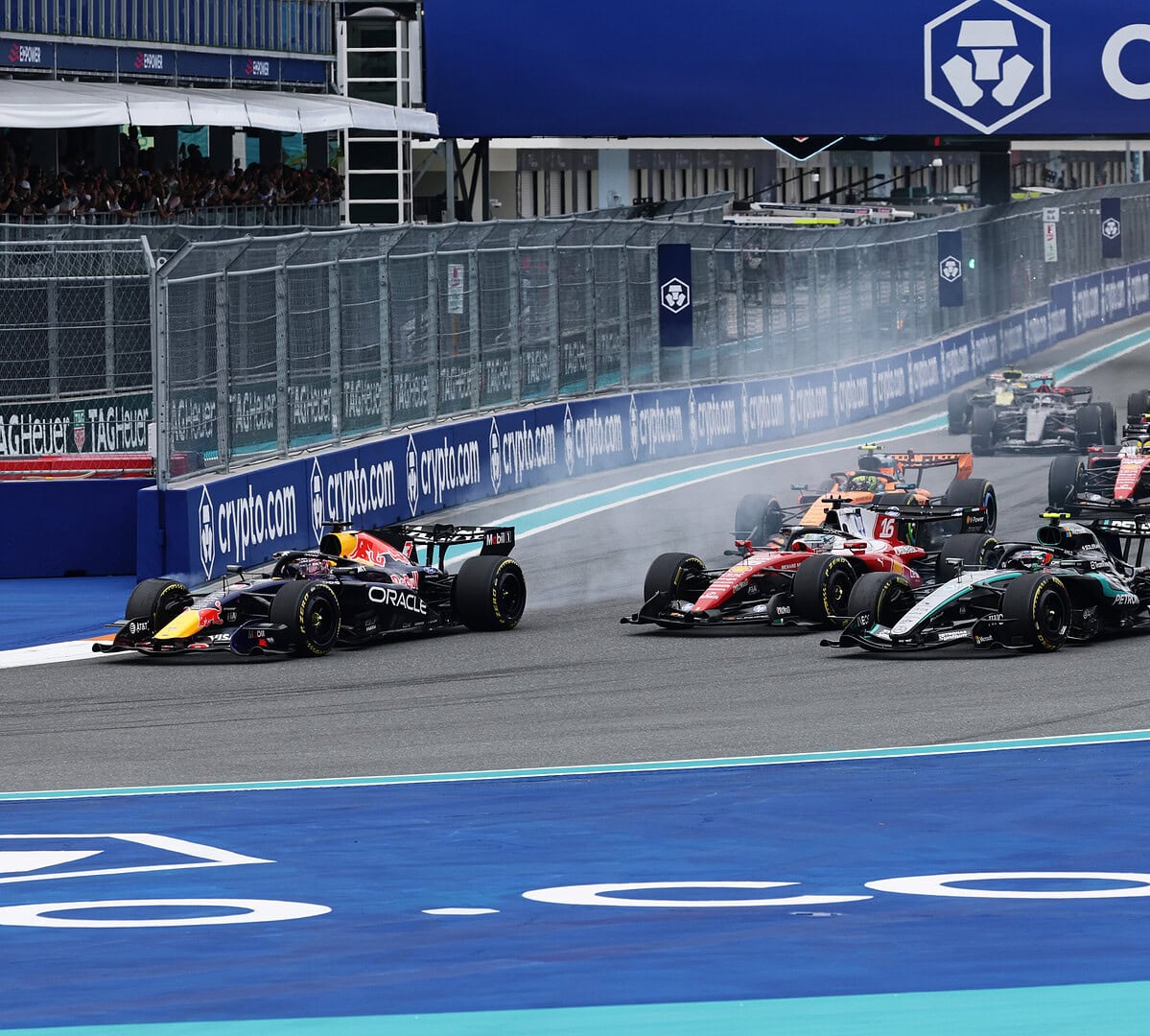 MIAMI, FLORIDA - MAY 03: Max Verstappen of the Netherlands driving the (3) Oracle Red Bull Racing RB22 Red Bull Ford leads Andrea Kimi Antonelli of Italy driving the (12) Mercedes AMG Petronas F1 Team W17 Charles Leclerc of Monaco driving the (16) Scuderia Ferrari SF-26 and the rest of the field at the start during the F1 Grand Prix of Miami at Miami International Autodrome on May 03, 2026 in Miami, Florida. (Photo by Mark Thompson/Getty Images) // Getty Images / Red Bull Content Pool // SI202605030196 // Usage for editorial use only //