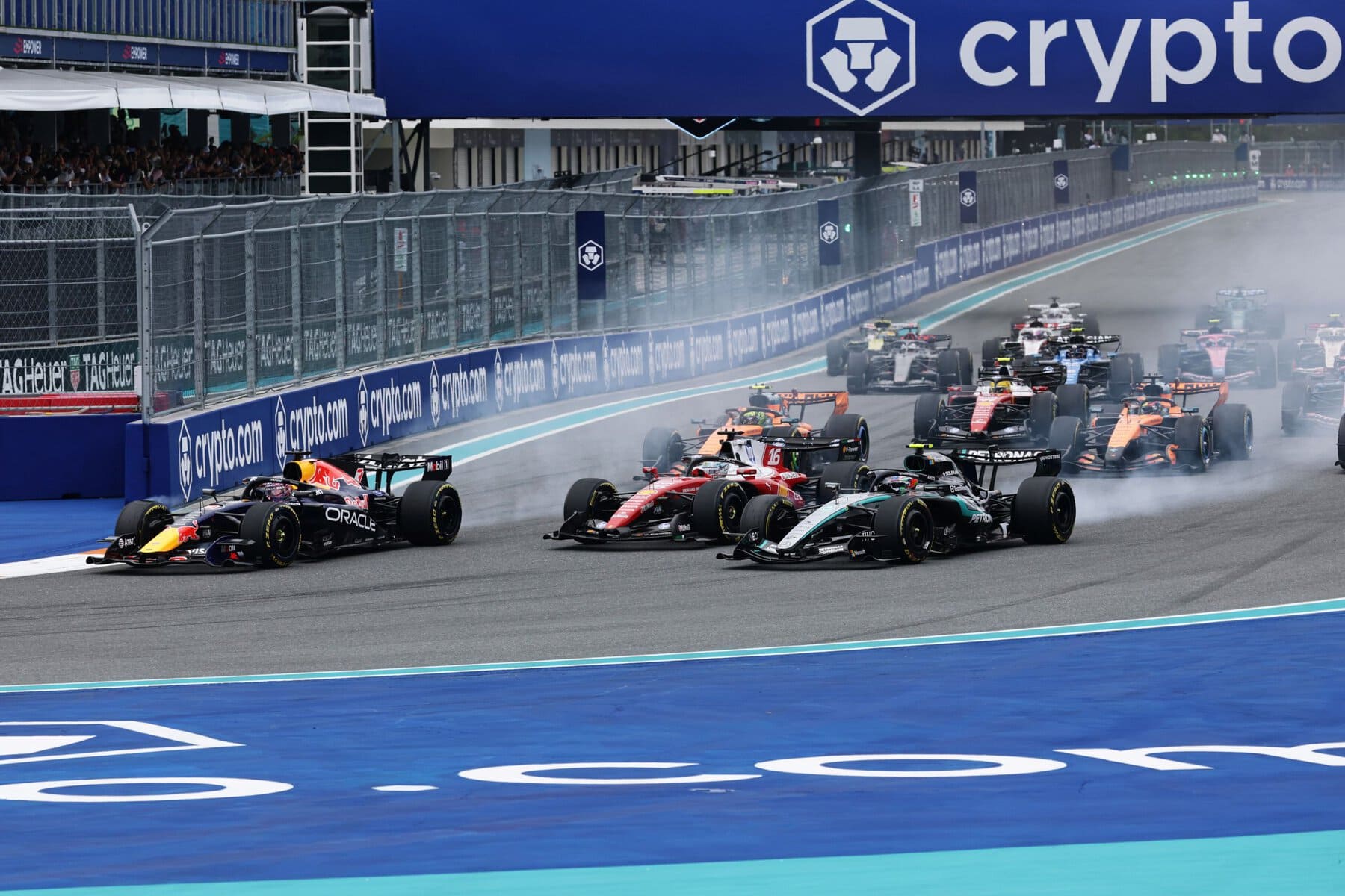 MIAMI, FLORIDA - MAY 03: Max Verstappen of the Netherlands driving the (3) Oracle Red Bull Racing RB22 Red Bull Ford leads Andrea Kimi Antonelli of Italy driving the (12) Mercedes AMG Petronas F1 Team W17 Charles Leclerc of Monaco driving the (16) Scuderia Ferrari SF-26 and the rest of the field at the start during the F1 Grand Prix of Miami at Miami International Autodrome on May 03, 2026 in Miami, Florida. (Photo by Mark Thompson/Getty Images) // Getty Images / Red Bull Content Pool // SI202605030196 // Usage for editorial use only //