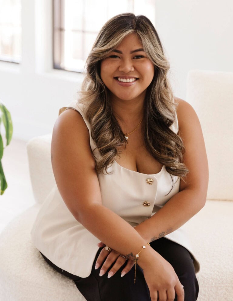 Faith Harmer smiling, real estate agent in Las Vegas, NV.