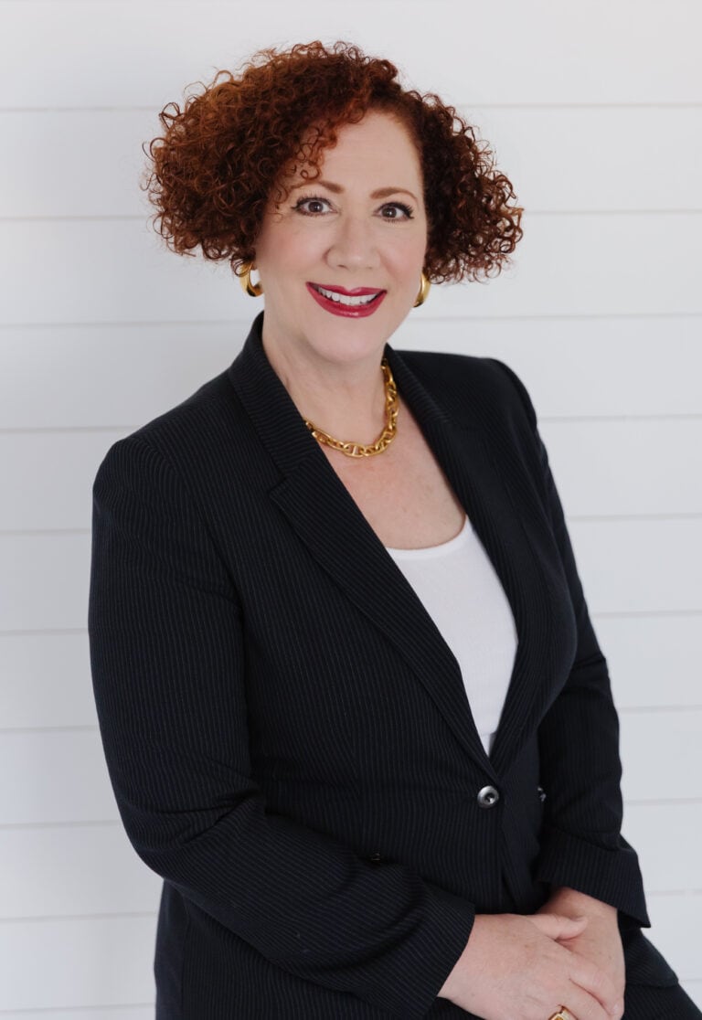 Faith Harmer, experienced real estate agent specializing in residential properties.