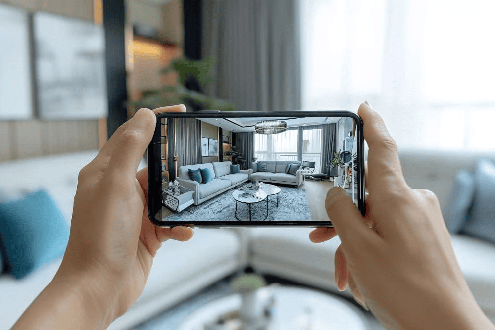 Interior design of a stylish living room with a smartphone in focus.