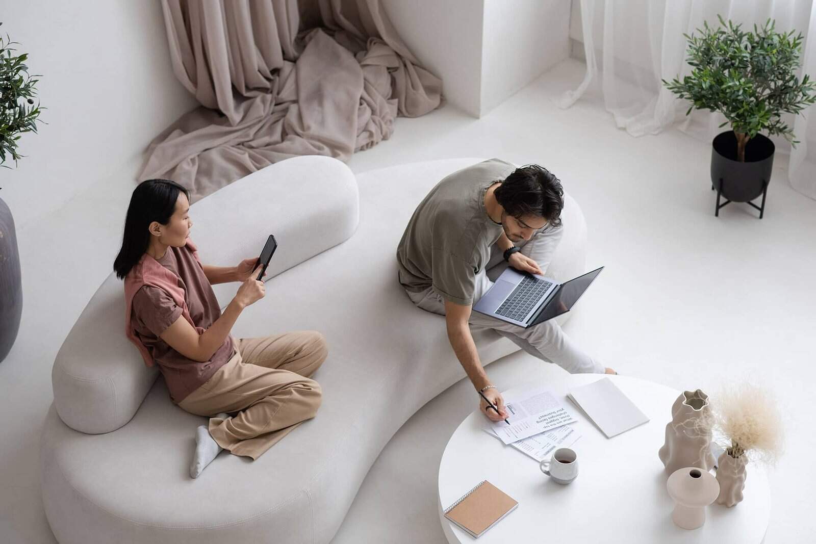 Home office setup with comfortable seating and natural light.