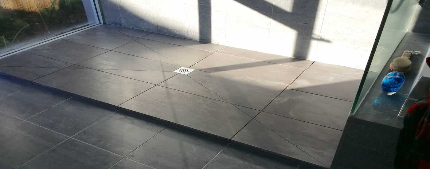 Modern shower base with sleek tile finish for contemporary bathrooms.