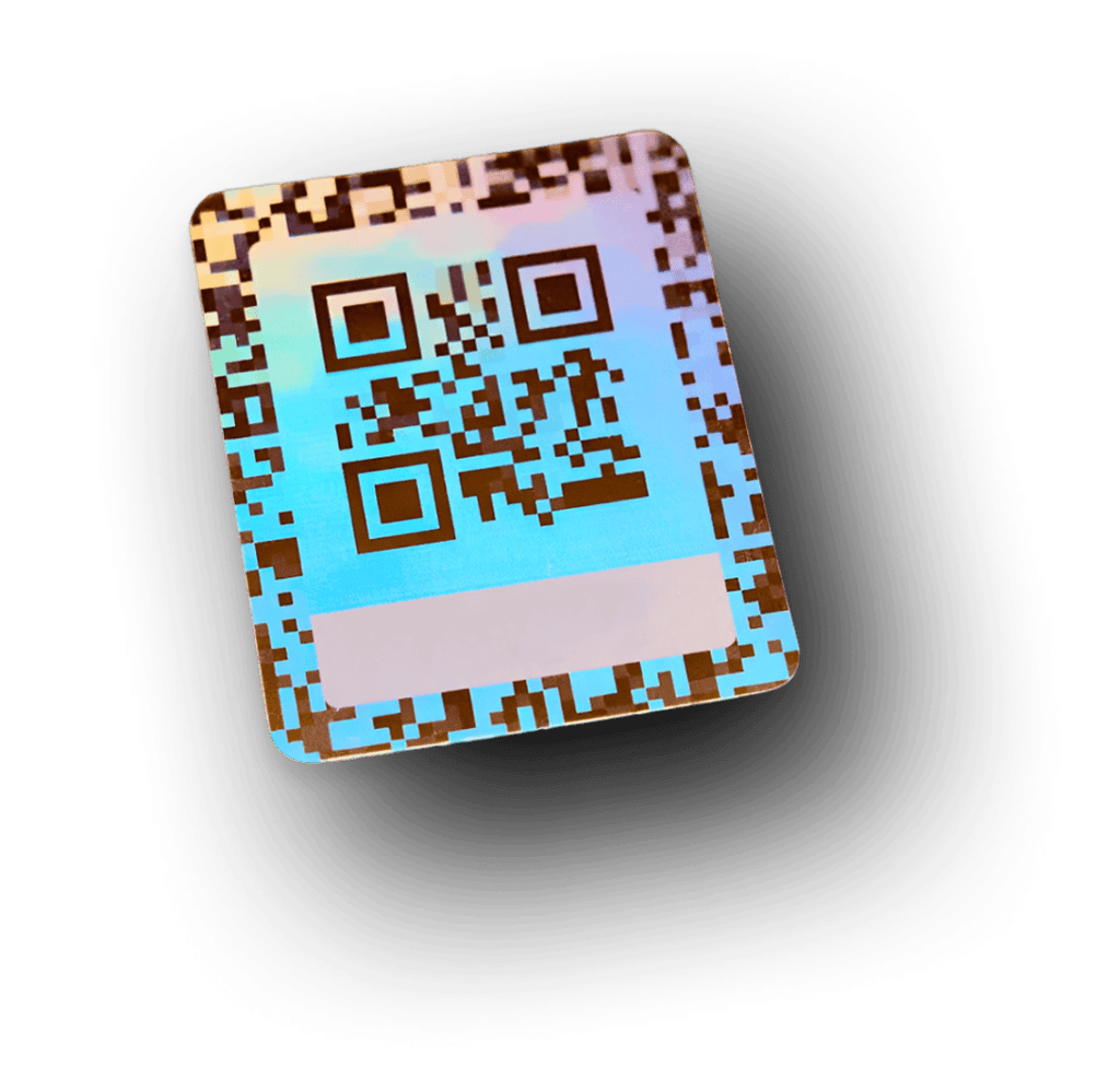 Holographic label with QR code and iridescent gradient surface demonstrating product authentication technology.