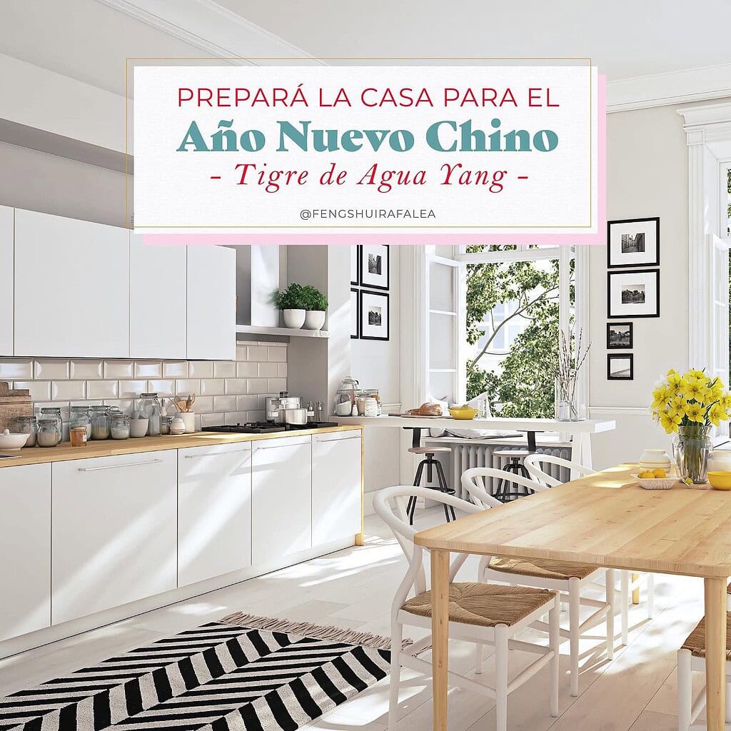 Cocina moderna y luminosa con decoración minimalista y detalles en blanco y madera.