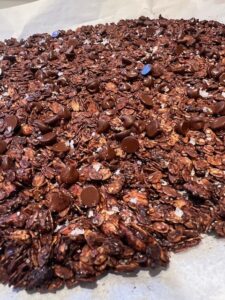 Picture of dark chocolate sea salt granola on a sheet pan.