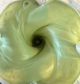 Picture of Lemon Basil Yogurt Dressing Mixing in a Vitamix.