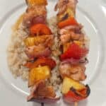 Pineapple Chicken Kabobs on a bed of brown rice.