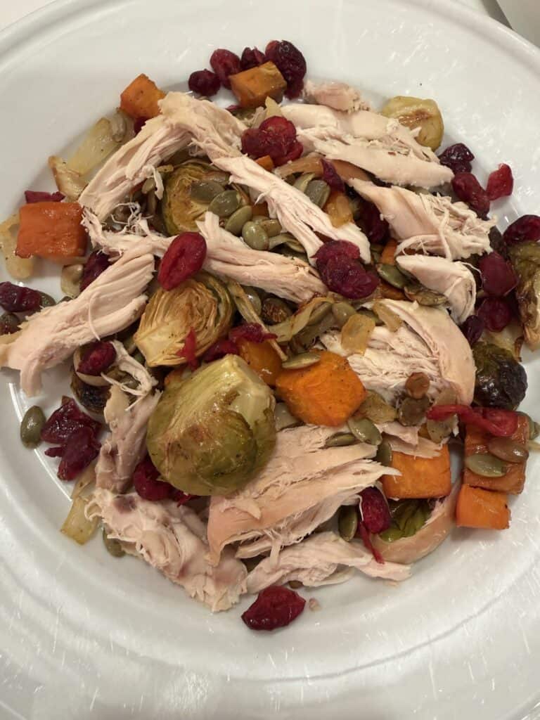 Picture of Savory Fall Harvest Veggies with rotisserie chicken and cranberries. 