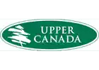 Green oval logo with white text reading UPPER CANADA. To the left of the text, there is a simple white silhouette of three stylized trees.