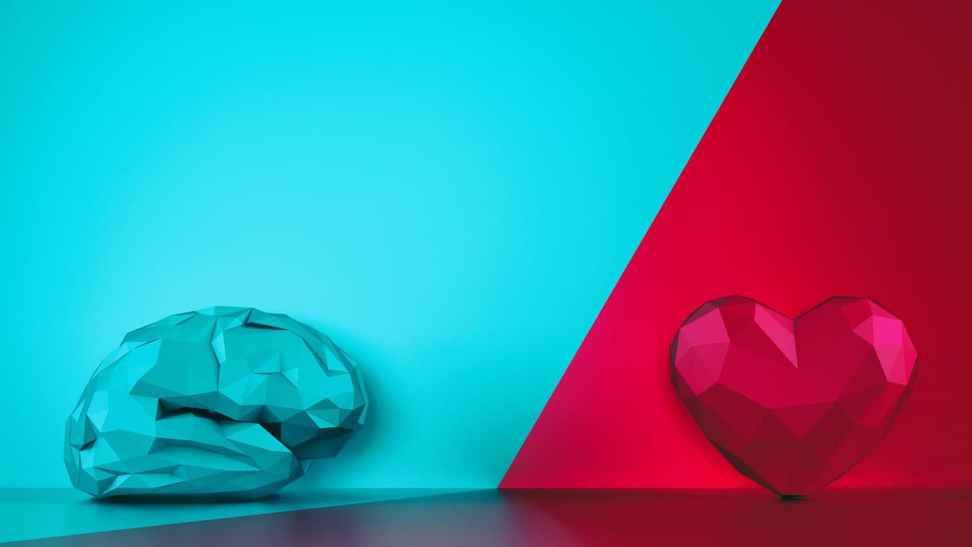 Cerebro y corazón en estilo geométrico, representación de la dualidad emocional y racional.